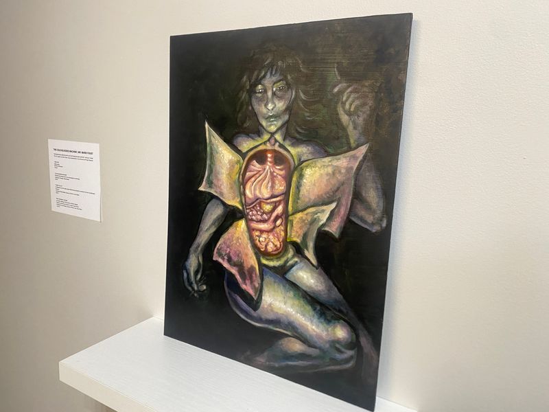 A self-portrait by Murry Foust titled "CREATOR." This oil painting on Masonite is a part of Foust's' senior art exhibit.