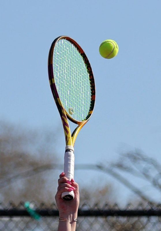 General image of a tennis ball and a racket.