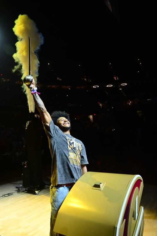 May 11, 2026; Cleveland, Ohio, USA; Cleveland Browns player KC Concepcion pulls the sword before game four between the Cleveland Cavaliers and the Detroit Pistons in the second round of the 2026 NBA Playoffs at Rocket Arena. Mandatory Credit: Ken Blaze-Imagn Images