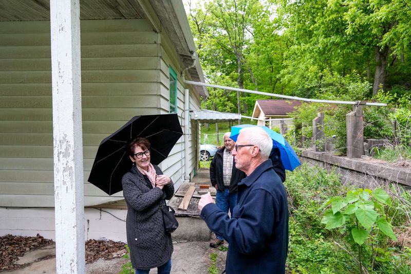 Enquirer reporter Patricia Gallagher Newberry interviews Mike Northcutt at what is taking shape as the William Forest Northcutt Nature Preserve in Delhi Township.