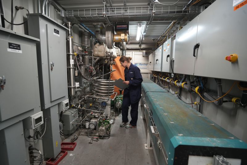 Operator Courtney Fuller works inside one of the containers that house an annihilator at Revive Environmental on May 11, 2026 at Revive’s facility on the West Side of Columbus. The PFAS Annihilator is destruction technology developed by Revive Environmental and Battelle that uses Supercritical Water Oxidation (SCWO) to destroy "forever chemicals" commonly known as PFAS.