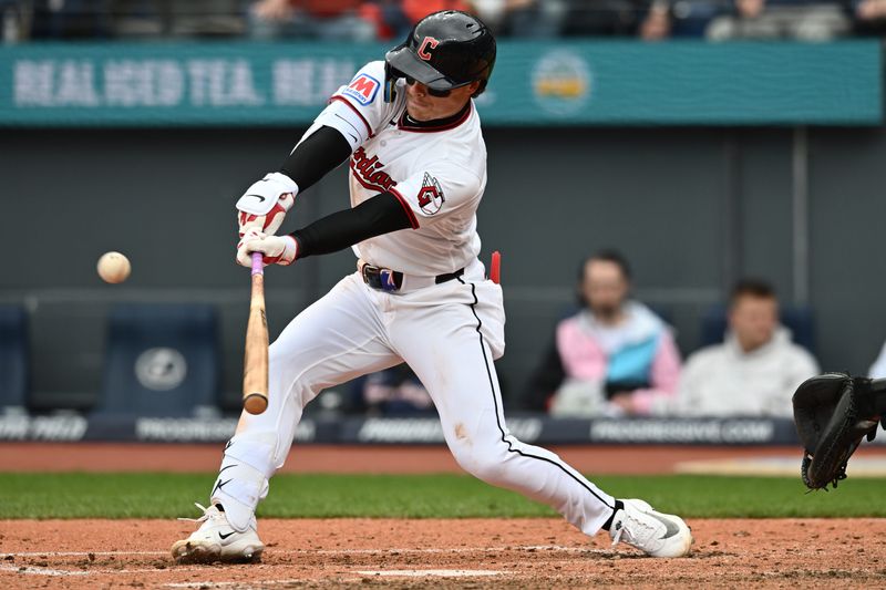 Guardians second baseman Travis Bazzana hits a single during the sixth inning against the Los Angeles Angels, May 13, 2026, in Cleveland.
