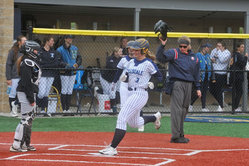 Hillsdale's Kennedy Fickes scores a run. The Falcons cruised to a 19-0 win over the Knights in a Division VI sectional championship on May 13, 2026.