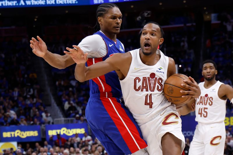 Cleveland Cavaliers forward Evan Mobley (4) is defended by Detroit Pistons guard Ausar Thompson during Game 5 of a second-round NBA playoff series May 13, 2026, in Detroit, Michigan.