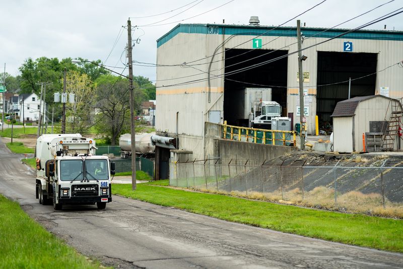 A Waste Management garbage truck approaches the Waste Management transfer facility located at 389 Fountain St, in Akron. It will be closing once a new facility on Archwood Avenue is built.