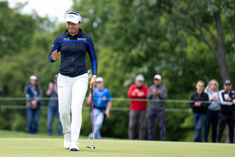 Jeeno Thitikul, of Bangkok, Thailand, reacts after hitting a putt during the first round of the LPGA Queen City Championship at Maketewah Country Club in Cincinnati on Thursday, May 14, 2026.