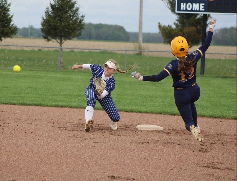 Lakota shortstop Lexi Moon fields a throw as a runner slides into second base in 2026.