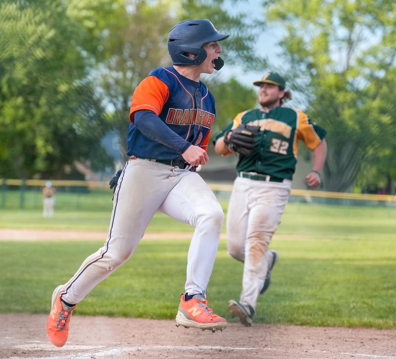 Ellet’s Keaton McKeel celebrates as he scores during the seventh inning of the City Series baseball championship against Firestone at Dave Marshall Field, May 15, 2026.