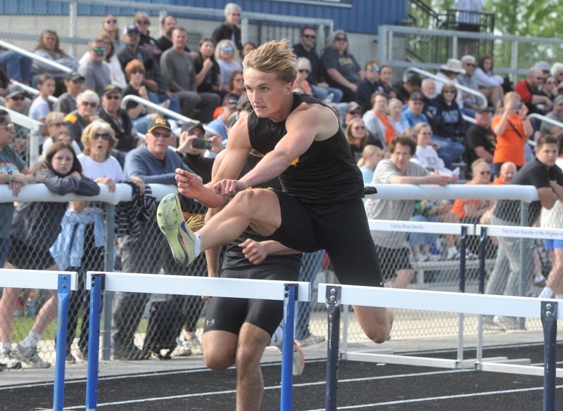 Colonel Crawford's Roen Thew leads the pack in the 110-meter hurdles at the Northern 10 track and field championships hosted by Carey High School on May 15, 2026.
