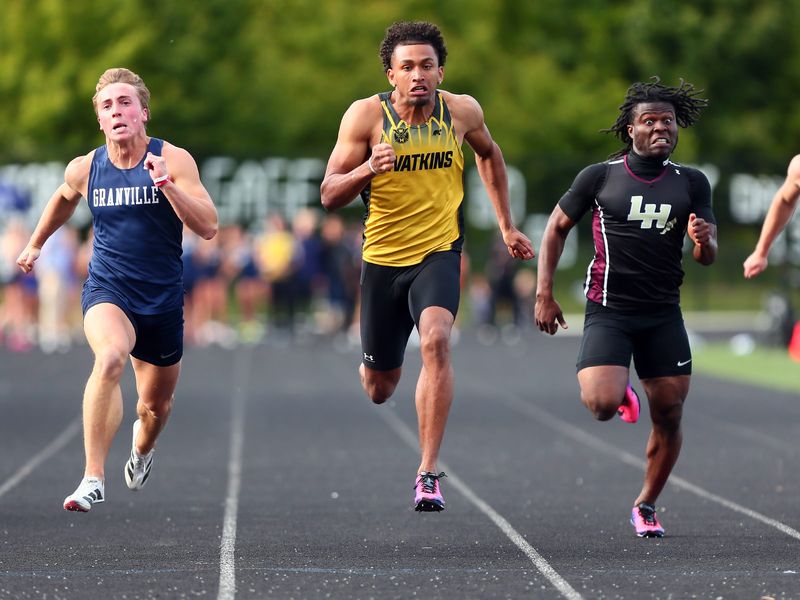 Granville's Bode Shoaps, Watkins Memorial's Ray Hardiman and Licking Heights' Samolu Cooper compete in the 100-meter dash during the LCL-Buckeye Championships held at Granville on May 15, 2026.