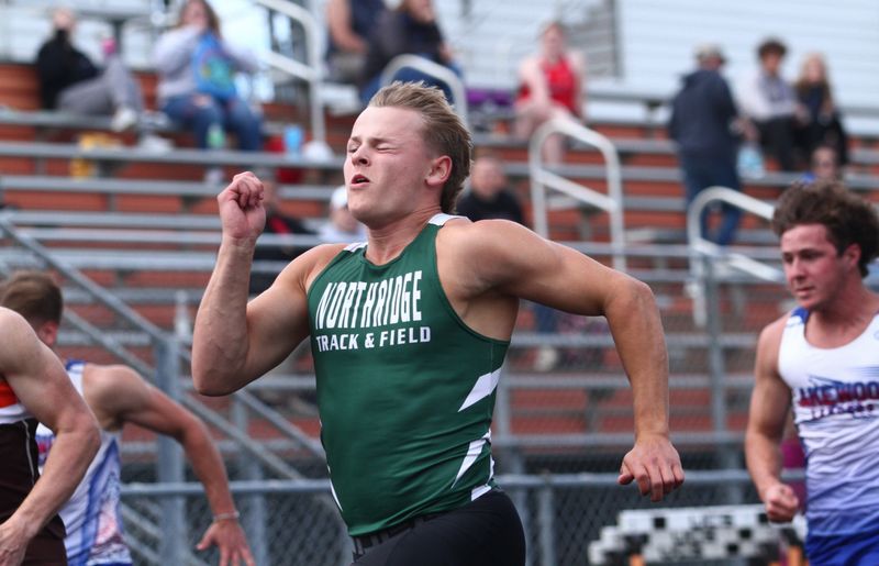 Northridge's Jamie Odrumsky leads the 100-meter dash during the LCL-Cardinal championships held at Heath on May 15, 2026.