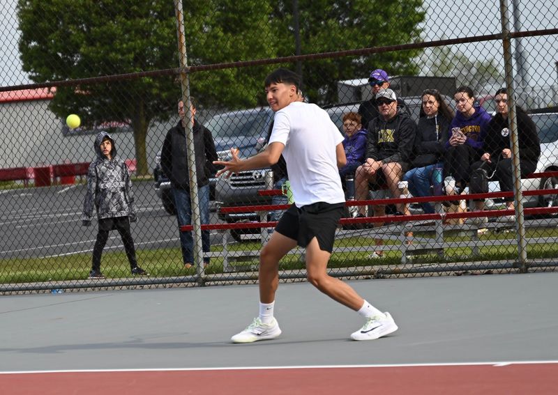 Lexington's Cooper Remy competed in the Division II sectional boys tennis tournament at Shelby High School.