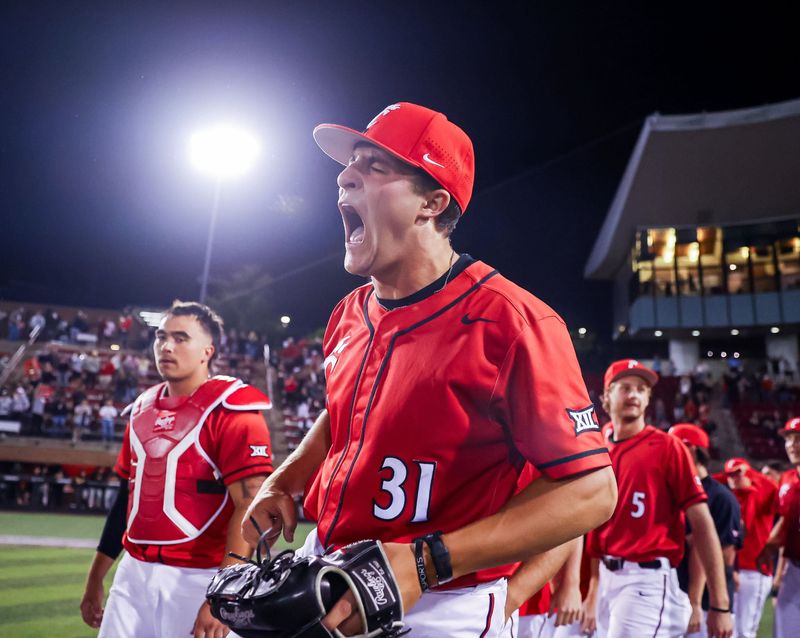Cincinnati Bearcats reliever Adam Buczkowski celebrates getting the save in UC's regular-season finale win over Texas Tech May 15.