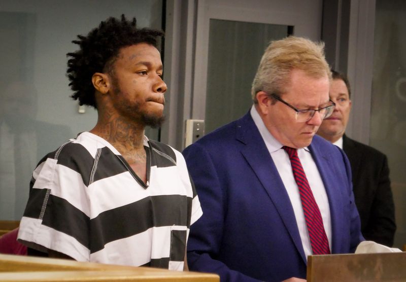Leonte Coston, right, appeared in Hamilton County Municipal Court May 18 on charges that he fatally shot fellow Metro bus passenger, James Bond.