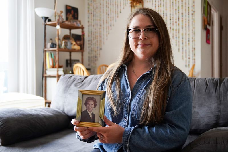 Alycia Randazzo holds a photo of her deceased great-aunt Mary Ellen Robinson, of Bellevue, May 14,, at her home in Columbia Tusculum. Robinson was a homicide victim of an unsolved crime dating back to May 1970.