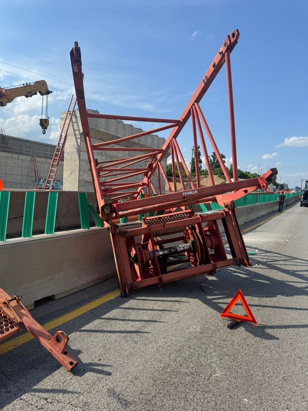 A collapsed crane lies on Interstate 75 around 6 p.m. May 19.