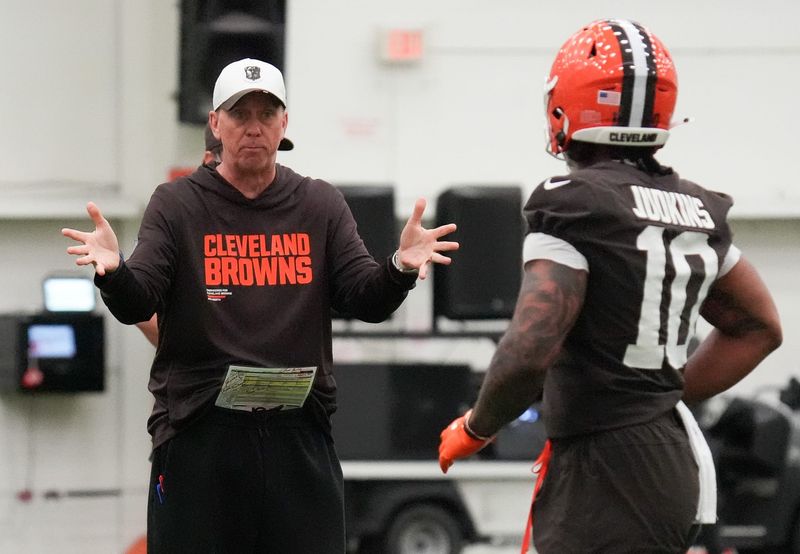 Coach Todd Monken talks with Quinshon Judkins during the Browns OTA camp in Berea on May 20, 2026.