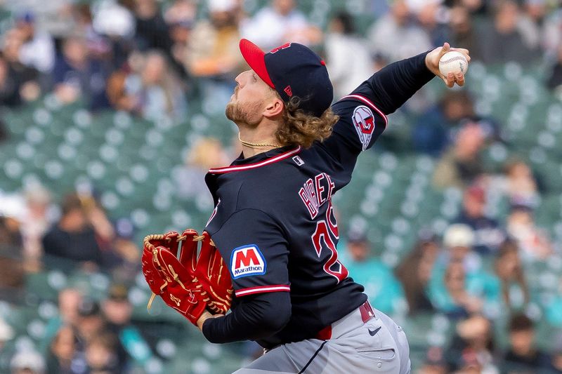 May 20, 2026; Detroit, Michigan, USA; Cleveland Guardians starting pitcher Tanner Bibee (28) delivers during the first inning against the Detroit Tigers at Comerica Park. Mandatory Credit: David Reginek-Imagn Images