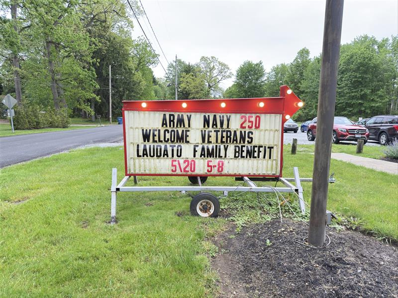 Hundreds of community members attended a dinner May 20 at the Army Navy 250 Club to benefit the Akron family who lost their home in a fatal plane crash.