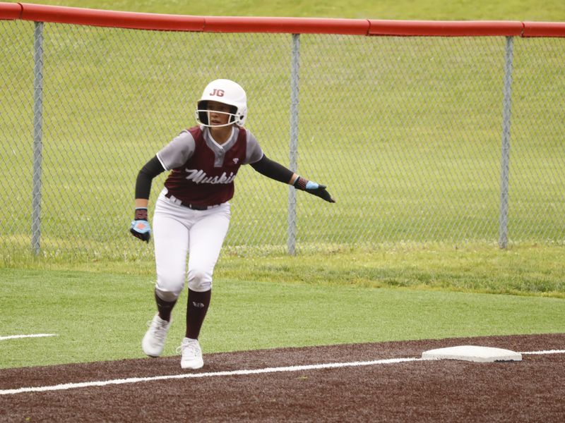 John Glenn's Libby Brown (4) dances off third base during the Division IV district championship game versus No. 1 seed Beaver Local on Wednesday, May 20, 2026 at Tusky Valley High School. The Muskies collected a 9-0 victory to win the district title and improve to the OHSAA Division IV Sweet 16.