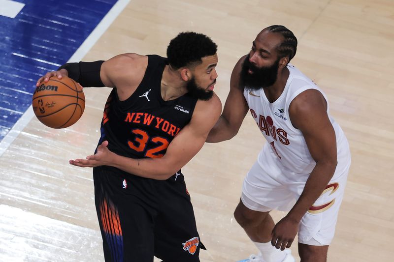Knicks forward Karl-Anthony Towns controls the ball against Cavaliers guard James Harden during the third quarter of Game 2 of the Eastern Conference Finals at Madison Square Garden, May 21, 2026.