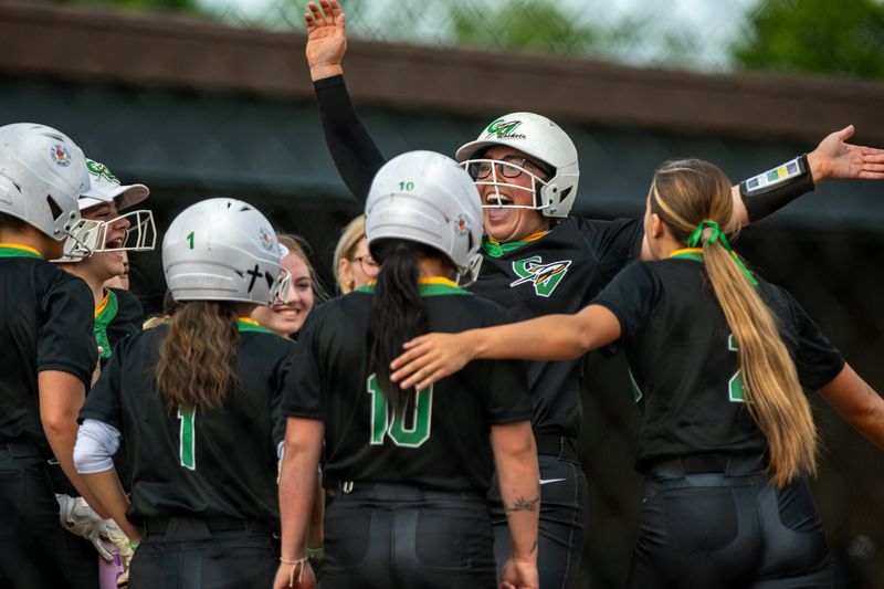 Conotton Valley’s Maddison Kelly celebrates at home plate after hitting a 3-run home run during the Division VII district championship softball game versus Caldwell in Byesville, OH on Thursday May 21st, 2026.
