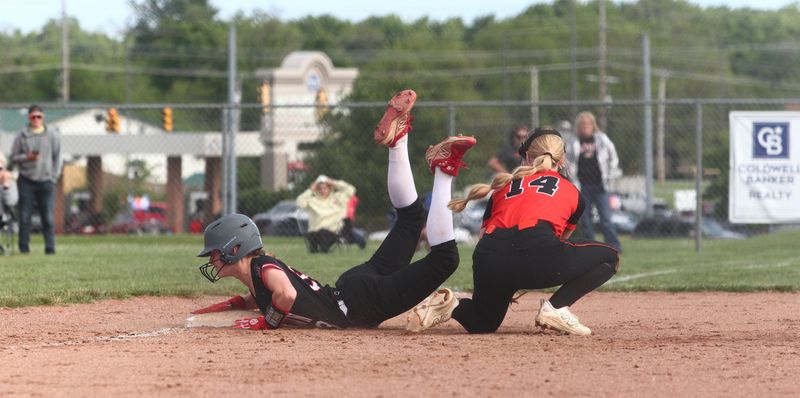 Johnstown's Brooklyn Wood slides safely into third base with a triple during the Johnnies' 2-0 victory against North Union to win a Division V district championship at Pickerington North on May 21, 2026.