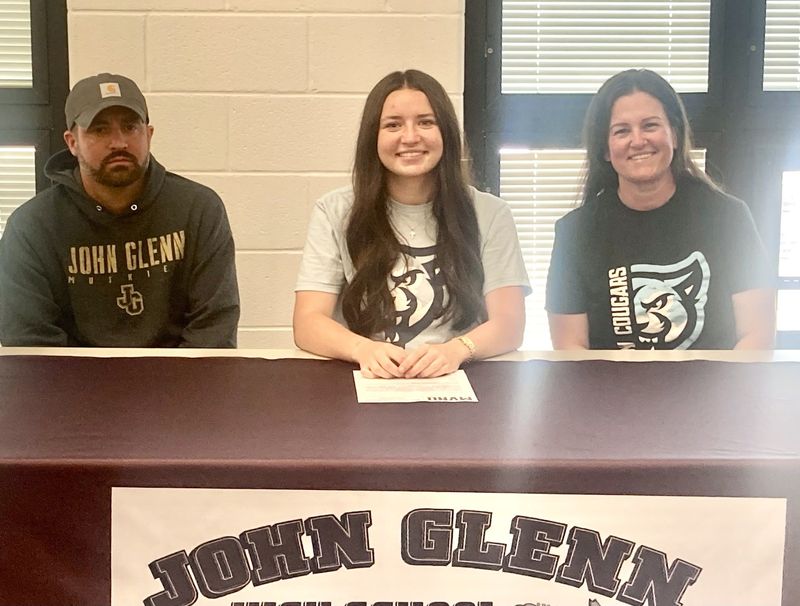 John Glenn senior Brelynn Barr's recently signed with Mount Vernon Nazarene University to participate in Women's Track and Field for the Cougars. MVNU is a member of the Crossroads League and NAIA. Barr is a three-year letter winner for the Muskies in track and was a regional qualifier last season in the shot put. Pictured are: Left to Right: Father Laramie Barr, Brelynn Barr, Mother Kristen Barr