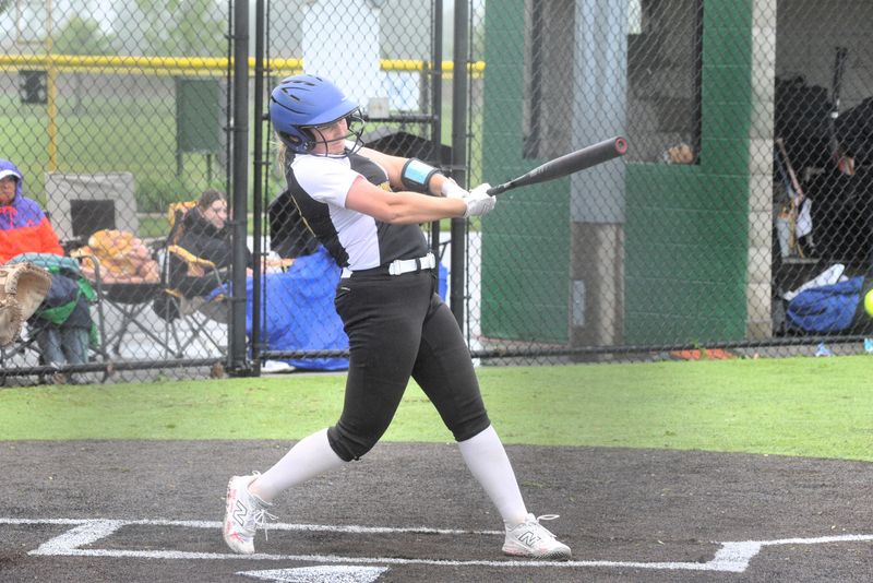 Ontario's Brylie Ireland puts a ball in play. The Warriors beat the Panthers 6-4 in a Division III district championship at the William P. Coontz Recreation Complex in Oregon on May 23, 2026.