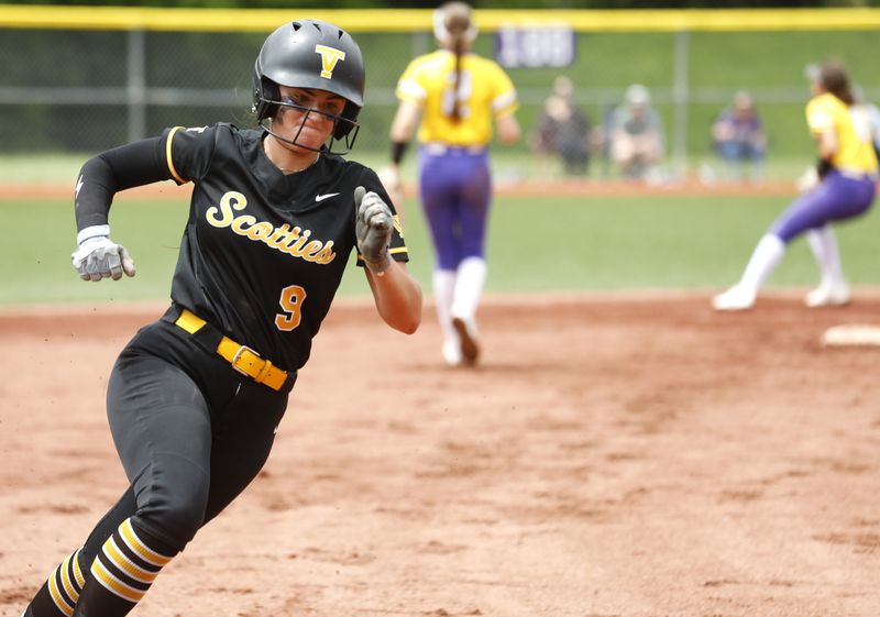 Tri-Valley third baseman Alivia Reffitt hits the afterburners around third base on he way to the plate during an 11-5 win against Chillicothe Unioto in a Division III East/Southeast district title on Saturday, May 23, 2026, at Logan High School in Logan, Ohio. Reffitt, who had three hits, also hit a home run as the Scotties had 14 hits, including four homers as they won their first district title since 2010.