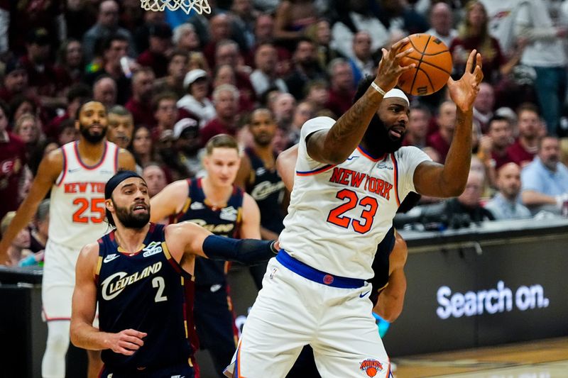 New York Knicks center Mitchell Robinson (23) grabs a rebound during the third quarter of game 3 of the NBA Eastern Conference Finals against the Cavs, May 23, 2026, in Cleveland.