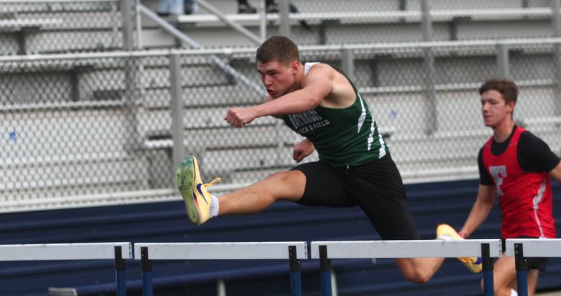 Northridge's Colton Isler leads the 110-meter hurdles during the Division IV, District 1 championships at Granville's Walter J. Hodges Stadium on May 23, 2026.