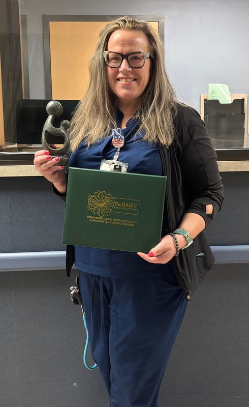 Amanda Jacobson, an emergency room nurse at Salem Regional Medical Center, received the hospital system's eighth DAISY Award, which honors outstanding service by the nursing staff.