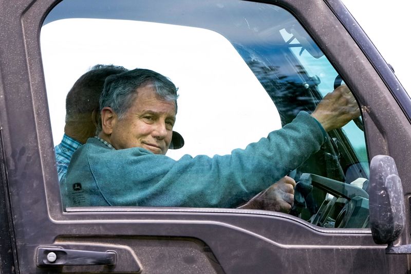 Former Sen. Sherrod Brown tours a farm in Pleasant City on May 15.