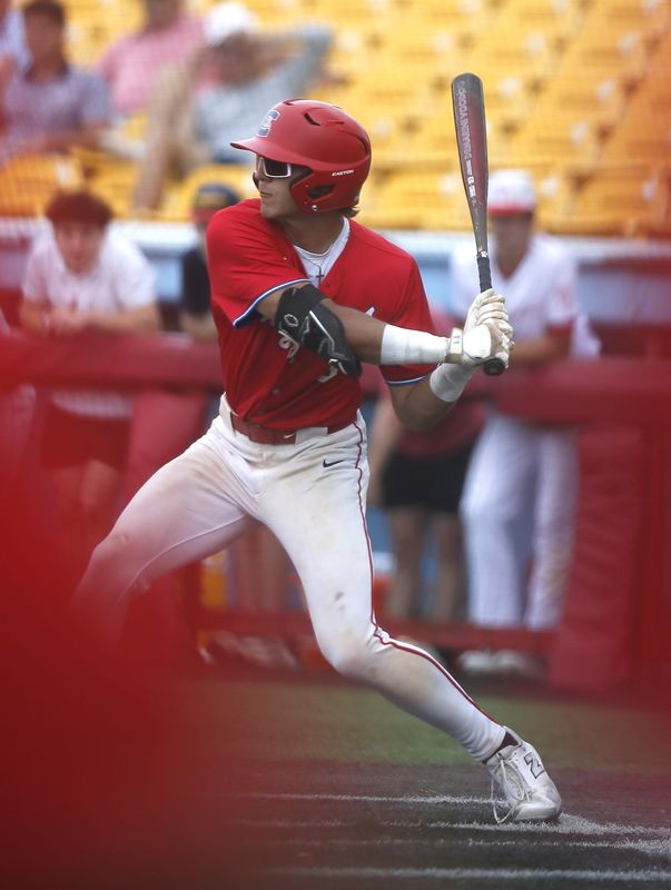 Conner senior Brady Bushman takes a swing as Conner beat St. Henry 9-4 in the KHSAA Ninth Region baseball tournament, May 25, 2026, at Thomas More Stadium.