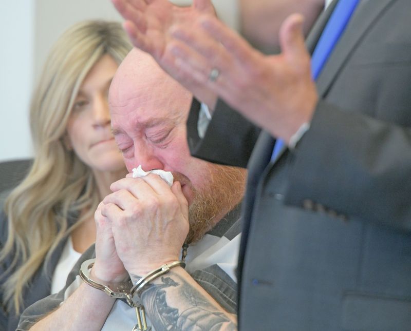 Brian Wilson weeps in court Tuesday during his sentencing. Wilson recieved a life sentence for the murder of Morrow County deputy Daniel "Weston" Sherrer.
