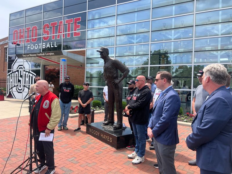 Michael DiSabato, a former Ohio State wrestler and the whistleblower who initially spoke out about sexual abuse that he and others endured at the hands of Strauss, was joined by fellow former Ohio State student athletes and central Ohio first responders outside the Woody Hayes Athletic Center on May 26, 2026.