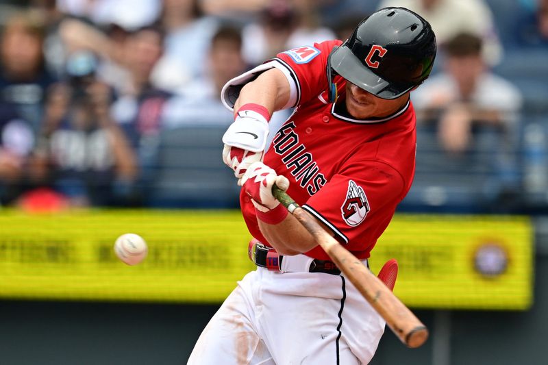 Guardians second baseman Travis Bazzana hits a double during the fifth inning against the Washington Nationals, May 27, 2026 in Cleveland.