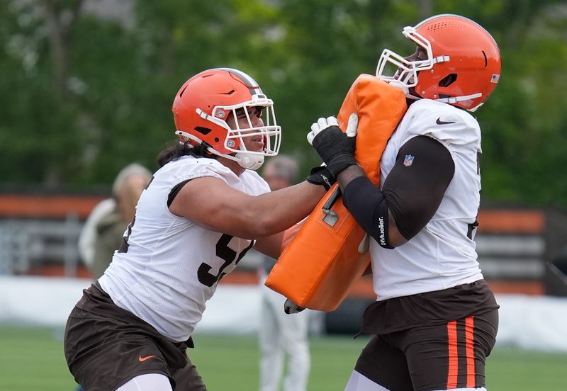 Spencer Fano works with a teammate at the Browns OTA in Berea on May 27, 2026.