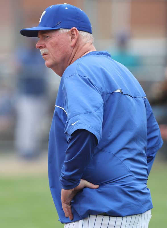 Tuslaw head baseball coach David Burkett watches his infield against Chagrin Falls in an OHSAA Division V district semifinal, Wednesday, May 27, 2026.