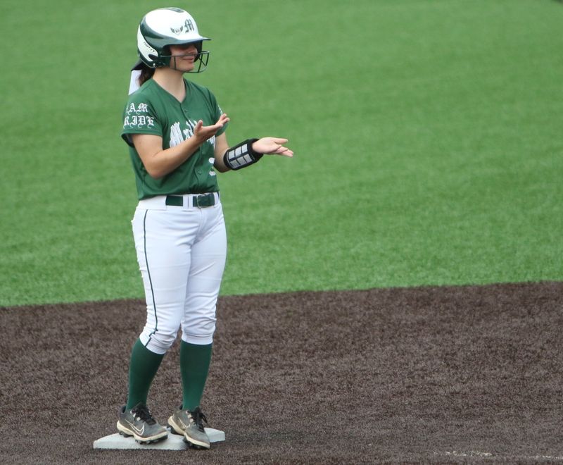 Madison's Chloe Jeffers celebrates an RBI double during the Rams' 7-0 Division III regional semifinal win over the Ontario Warriors on Wednesday, May 27, 2026 at Ashland University's Deb Miller Stadium.