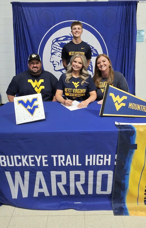Buckeye Trail senior Vayda Neuhart recently signed to continue her academic career and start a new Division I athletic career with the women's rowing team at West Virginia University. During her Warriors' sports career, Neuhart participated in five sports including, basketball, track, volleyball, softball and trap shooting. Pictured are Vayda Neuhart, center, with parents Kala and Garen Neuhart and brother Van in back.