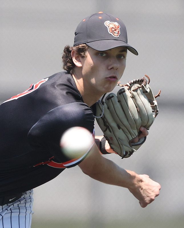 Hoover’s Evan Fuller, delivering a pitch against Green last week, threw a one-hitter Wednesday.