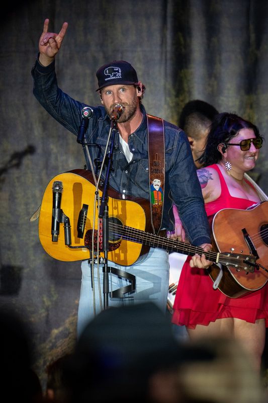 Chase Rice performs during a free pop-up concert outside of Losers Bar & Grill in Nashville, Tenn., Thursday, May 28, 2026.
