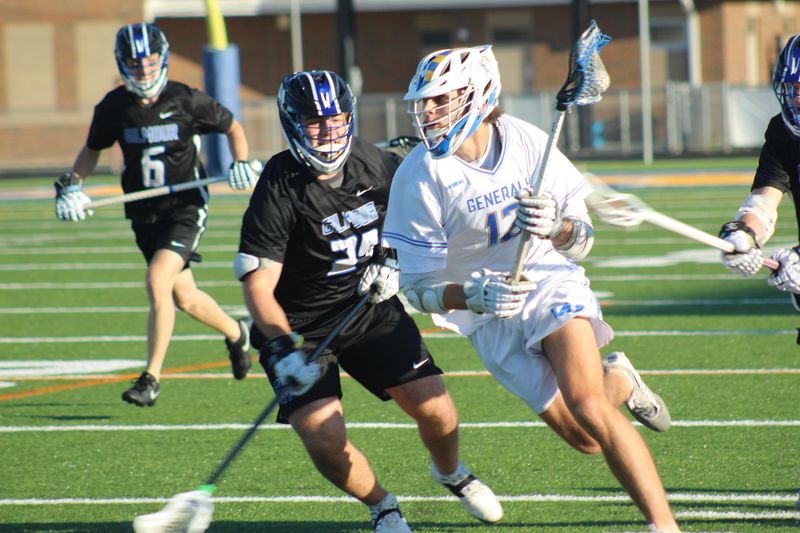 Wooster's Jack Thomas makes a run in the first quarter. Wooster was defeated by Gilmour Academy 8-7 in Thursday's Division II regional final.