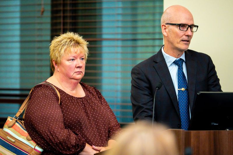 Angela Hawsman, left, represented by her attorney Paul Siegferth Jr., listens as Judge Jennifer Towell delivers her sentence for theft, May 29, 2026, at the Summit County Court of Common Pleas in Akron, Ohio. Hawsman, a 61-year-old former Summit County Fair board member, pleaded guilty to stealing over $24,000 from the fair's 4-H Club and horse camp between 2017 and 2024.