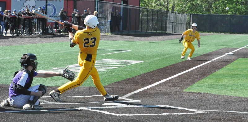 Waynedale batter Brayden Steiner hits a hard ball down third base line as baserunner Collin McGlothlin followed by Maddox Kidd scored two runs in the bottom of the seventh inning for the win. Waynedale squared off with Keystone in the Division V district final at Thurman Munson 
Stadium in Canton. Waynedale scored four runs in the bottom of the 7th inning to win the game 8-7.
