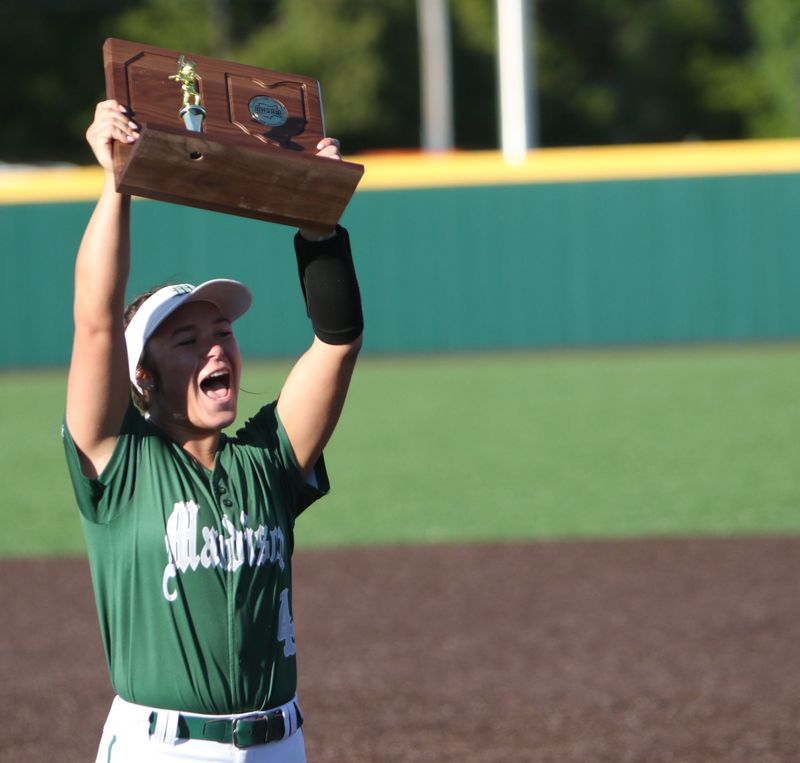Madison's Campbell Kiser raises the trophy during the Rams' 3-1 Division III regional championship win over Uniontown Lake on Friday, May 29, 2026 at Deb Miller Stadium on the campus of Ashland University.