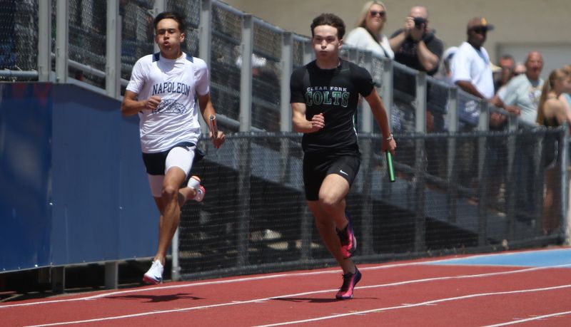 Clear Fork's Devyn Oswalt runs his leg of the 4x100-meter relay during the Division III regional championship track and field meet on Saturday, May 30, 2026 at Piqua High School.