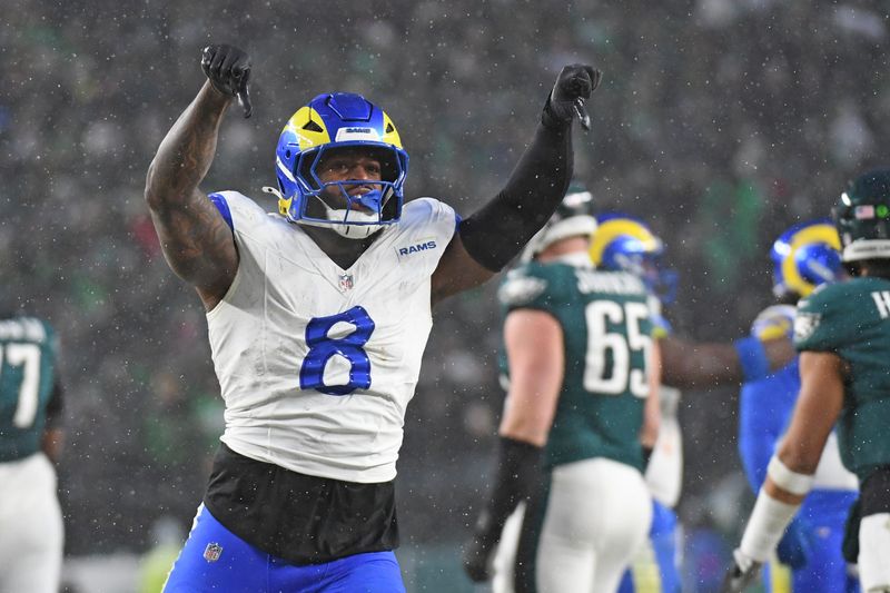Jan 19, 2025; Philadelphia, Pennsylvania, USA; Los Angeles Rams linebacker Jared Verse (8) reacts after a play against the Philadelphia Eagles in a 2025 NFC divisional round game at Lincoln Financial Field. Mandatory Credit: Eric Hartline-Imagn Images